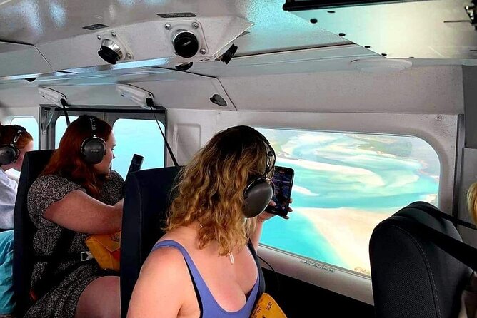 1hour Scenic Flight Heart Reef, Whitehaven Beach, Hill Inlet, GBR - Boarding a small aircraft with a window for everyone