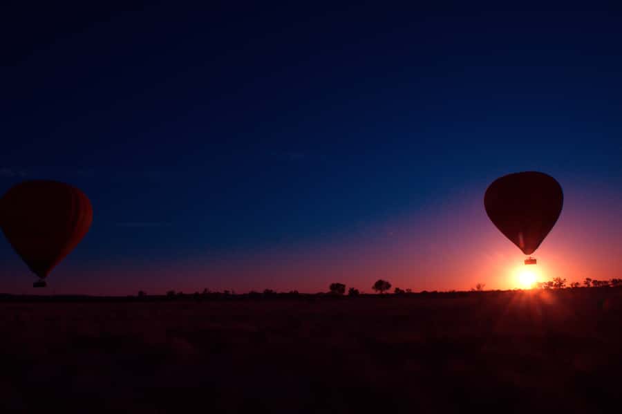 Alice Springs: Early Morning Hot Air Balloon Flight - Watching the balloon rise beside the MacDonnell Ranges
