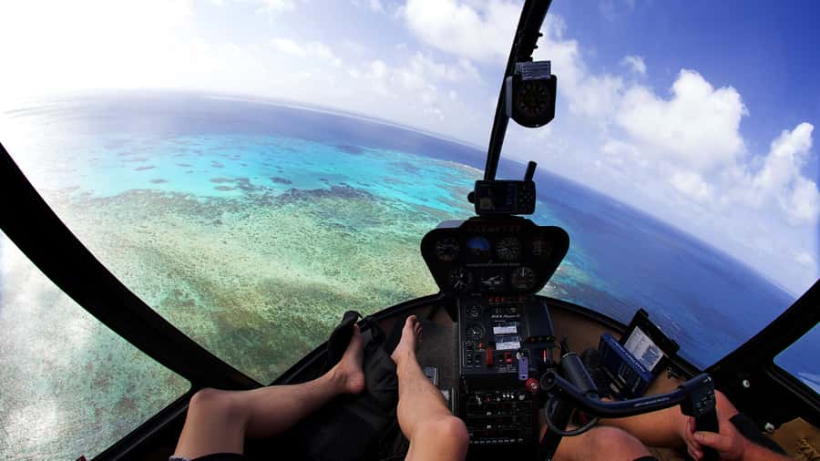 Cairns: Great Barrier Reef Cruise & Scenic Helicopter Flight - Riding Evolution to the outer reef