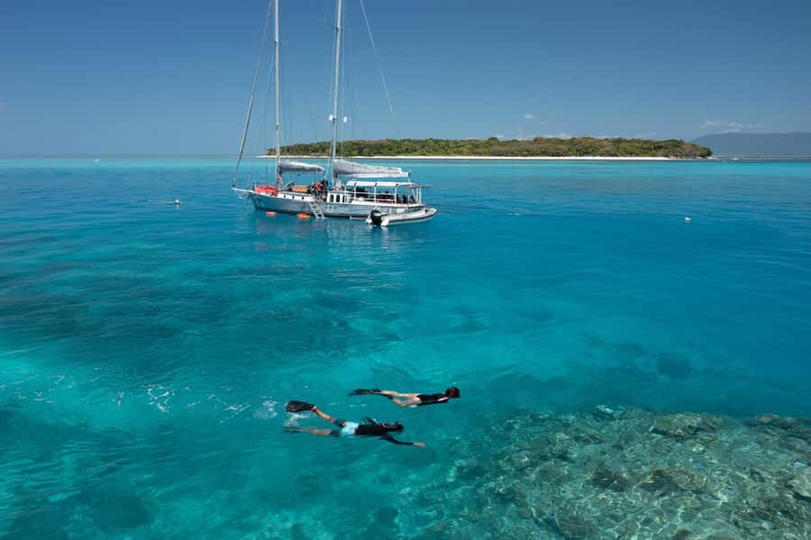 Cairns: Green Island & Great Barrier Reef Sailing Tour - Morning on board: coffee, pastries, and open water