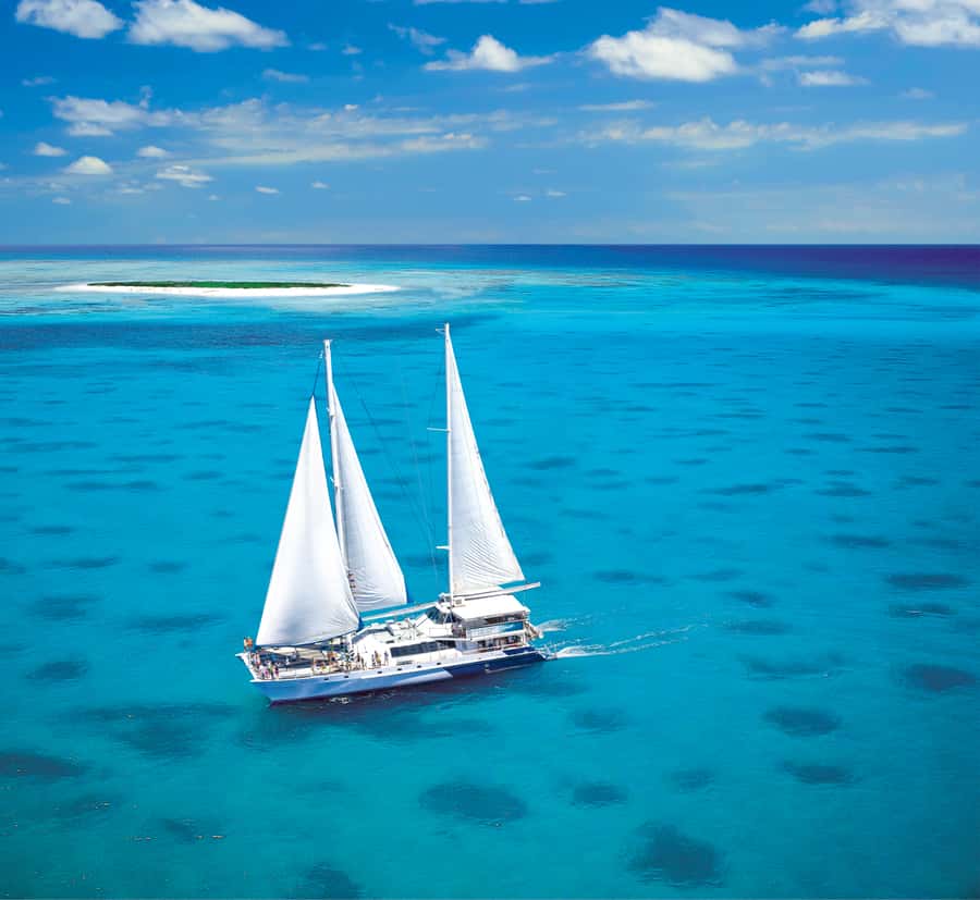 Cairns: Ocean Spirit Great Barrier Reef Full Day Tour - Setting out from Cairns on a 32-meter catamaran
