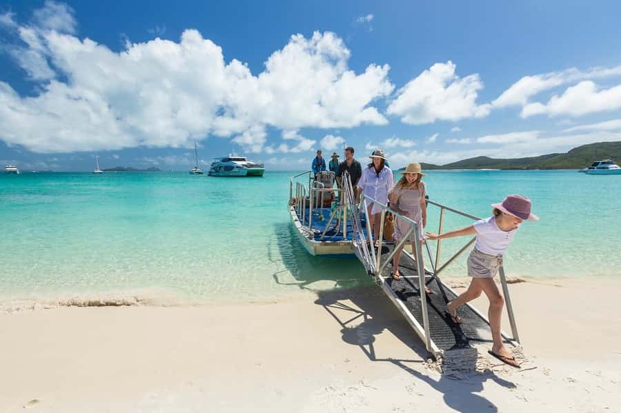 From Airlie: Whitsundays and Whitehaven Half-Day Cruise - Swimming, paddleboards, and stinger suits