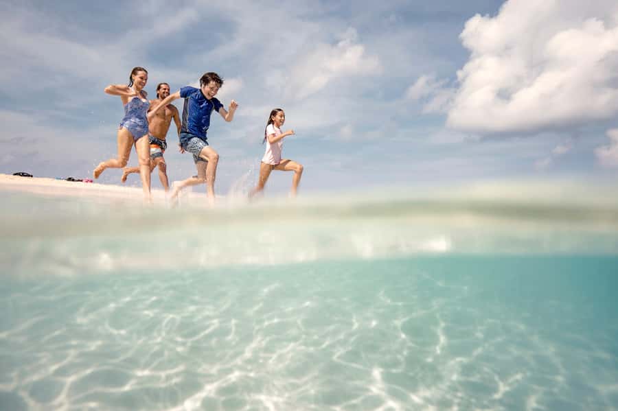 From Port Douglas: Outer Reef Cruise by Luxury Catamaran - Snorkeling help for different confidence levels