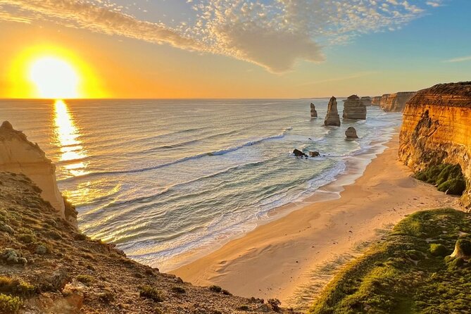 Full-Day Great Ocean Road and 12 Apostles Sunset Tour from Melbourne - Memorial Arch explains the road beneath you