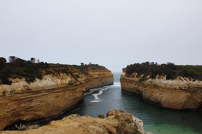 Great Ocean Road 12 Apostles kangaroo, koala and chocolate tour - The Memorial Arch and the meaning of the road