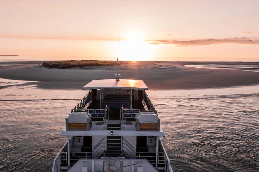 Hervey Bay: Sunset Cruise to Great Sandy Marine Park - Champagne, nibbles, and what you actually receive