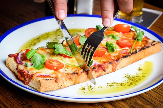 Melbourne Food Tour with 8+ Food Tastings in Hidden Laneways - Starting under the clocks at Flinders Street