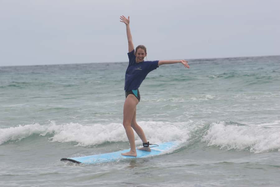 Miami: Group Surf Lesson - Catching waves on a beginner-friendly beach