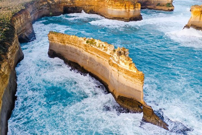 Small-Group Great Ocean Road Day Trip from Melbourne - Loch Ard Gorge adds a story to the scenery