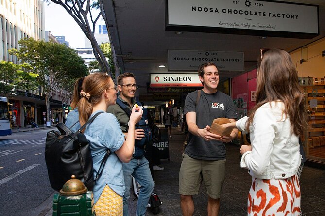 Ultimate Brisbane Walking Tour (Small-Group, Drink Included) - City Hall, Queen Victoria, and Miller Park explain power and colonisation