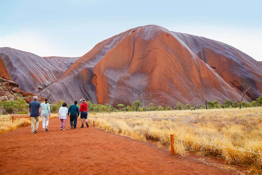 Uluru: Guided Walking Tour at Sunrise with Light Breakfast - Sunrise beside the red rock